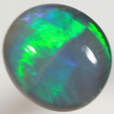SOLID SEMI BLACK OPAL Bright green rolling flashes